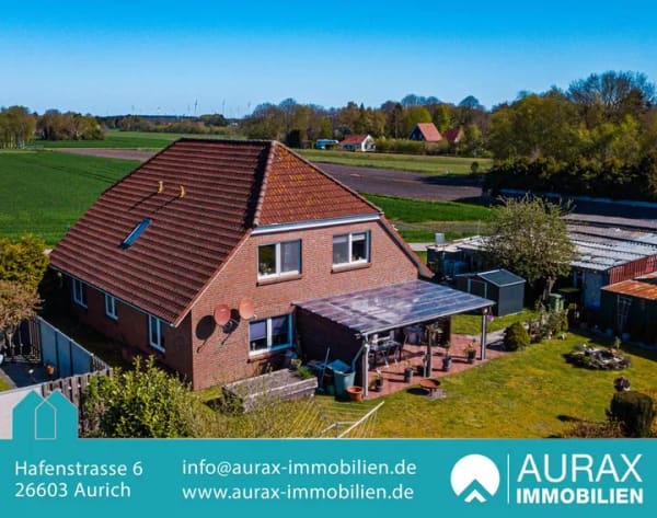 Immobilie in Großheide - Solides Zweifamilienhaus mit Klinker und Krüppelwalmdach in ruhiger Lage von Großheide — 175 m² Wohnfläche, zwei Einheiten, großes Grundstück - Bild 0