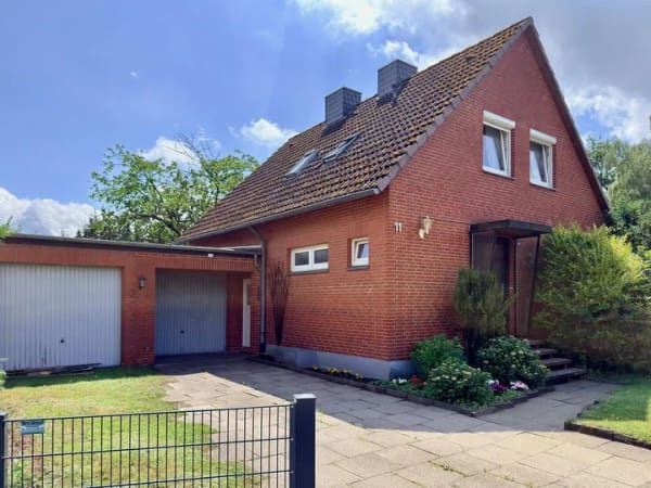 Immobilie in Reppenstedt - Freistehendes Einfamilienhaus mit großem Garten und Doppelgarage in Reppenstedt - Bild 1