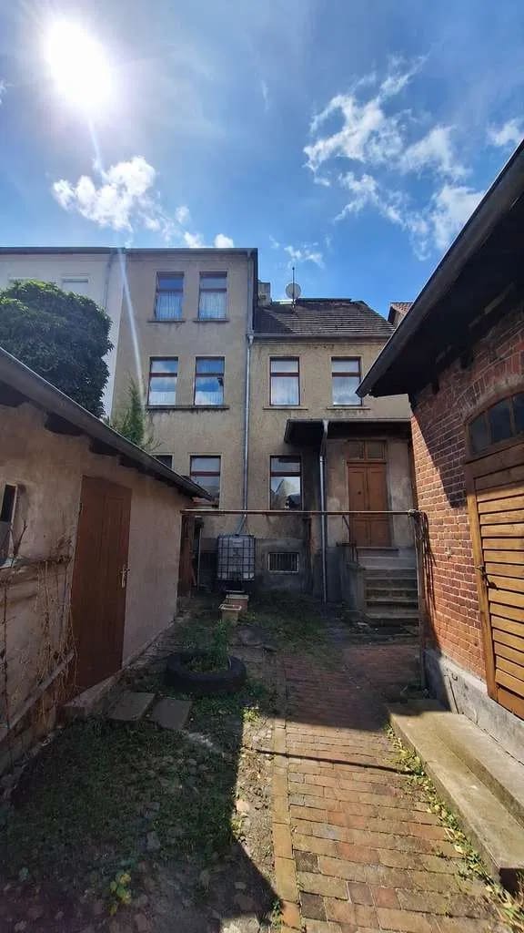Immobilie in Burg - Mehrfamilienhaus mit zwei Wohneinheiten, Ausbaureserve im Dachgeschoss und großzügigem Nebengelass - Bild 2