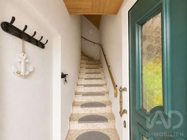 Immobilie in Uplengen - Oberwohnung mit Kanalblick, Balkon und viel Gestaltungspotenzial in Remels - Bild 1