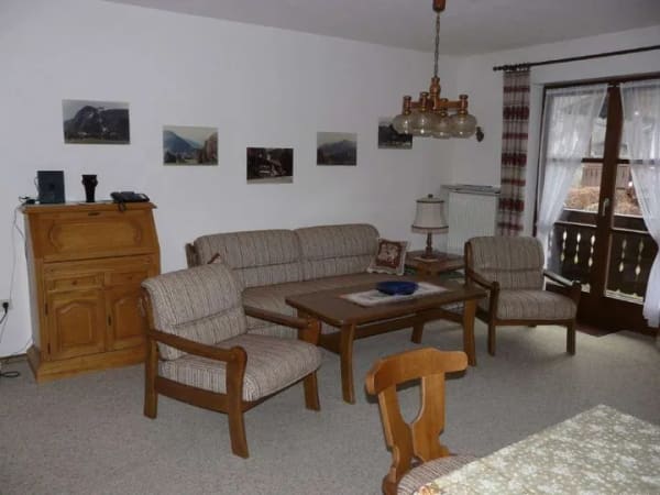 Immobilie in Unterwössen - Außergewöhnliche, ruhige 2-Zimmer-Wohnung mit großem Ost-/West-/Südbalkon, EBK, Einzelgarage, Keller - Bild 0