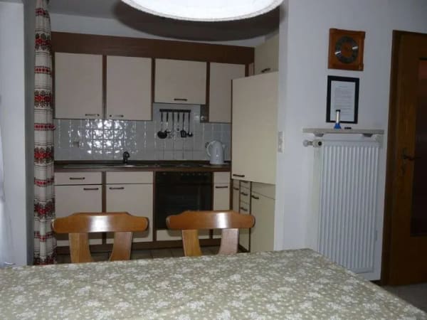 Immobilie in Unterwössen - Außergewöhnliche, ruhige 2-Zimmer-Wohnung mit großem Ost-/West-/Südbalkon, EBK, Einzelgarage, Keller - Bild 3