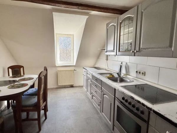 Immobilie in Freiberg - Solides Mehrfamilienhaus mit Altbauflair und Entwicklungspotenzial - Bild 2