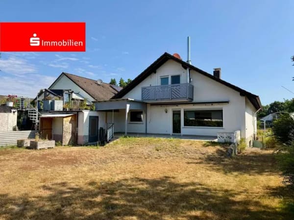 Immobilie in Heusenstamm - Ein-/ Zweifamilienhaus mit schönem Garten und Garage in gesuchter Wohnlage! - Bild 0