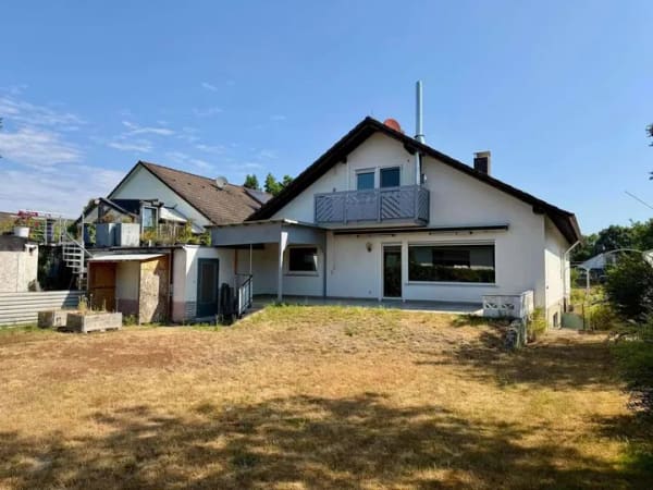 Immobilie in Heusenstamm - Ein-/ Zweifamilienhaus mit schönem Garten und Garage in gesuchter Wohnlage! - Bild 1