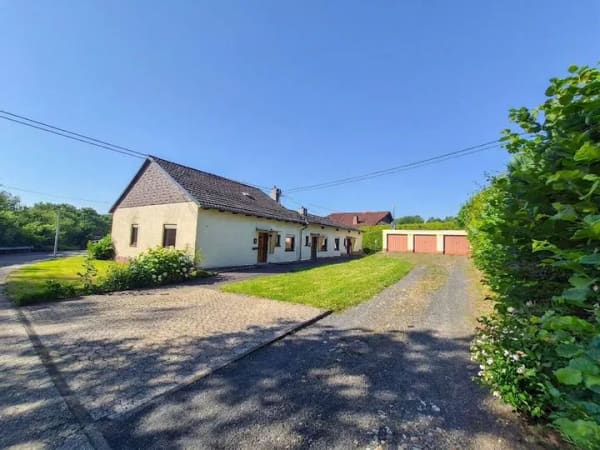 Immobilie in Döttesfeld - Gepflegtes 3-Parteienhaus im Bungalowstil in zentraler Wohnlage von Puderbach zu verkaufen! - Bild 1