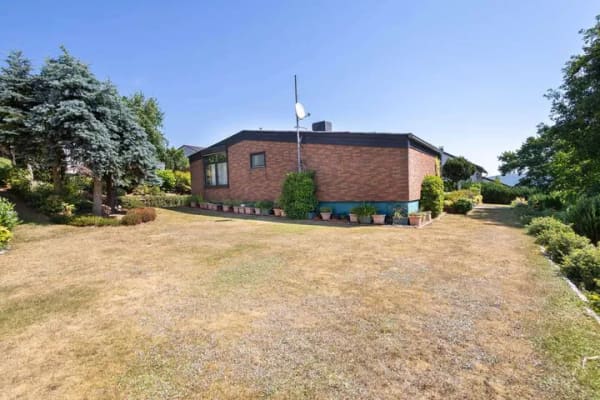 Immobilie in Sippersfeld - Lichtdurchfluteter Bungalow-Traum mit paradiesischem Flair - Bild 1