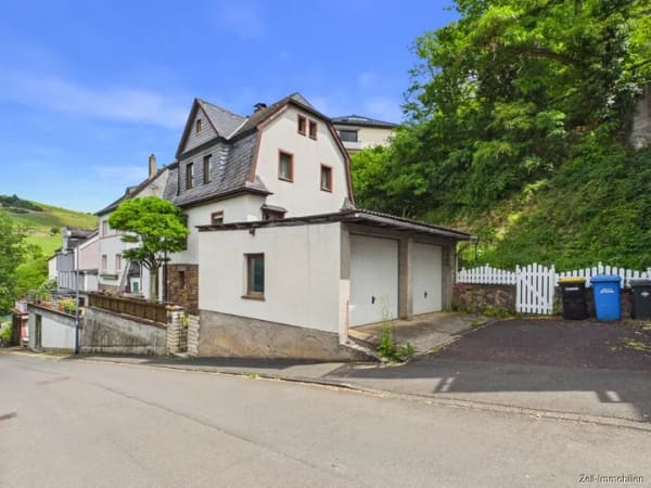 Immobilie in Rüdesheim am Rhein - Einfamilienhaus mit Doppelgarage und Garten - Bild 1