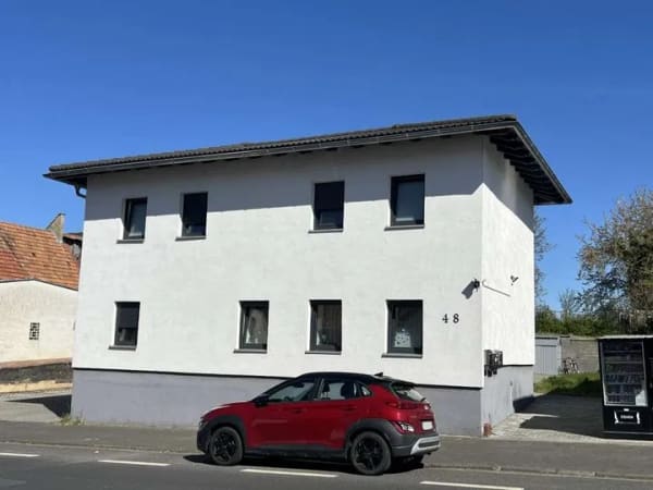 Immobilie in Langgöns - Attraktives Anlageobjekt: Modernisiertes Mehrfamilienhaus mit 3 Wohneinheiten in Langgöns - Bild 0