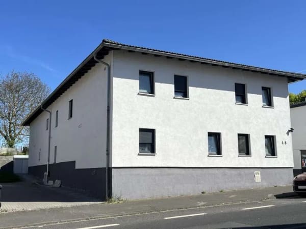 Immobilie in Langgöns - Attraktives Anlageobjekt: Modernisiertes Mehrfamilienhaus mit 3 Wohneinheiten in Langgöns - Bild 3