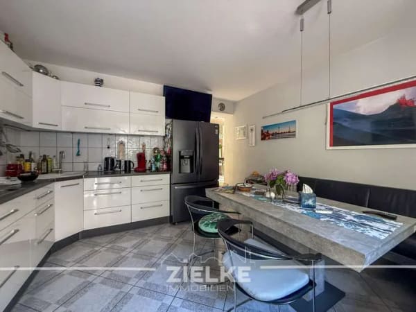 Immobilie in Erkrath - Drei-Familienhaus mit Balkon, Sonnenterrasse & Garten - Bild 3