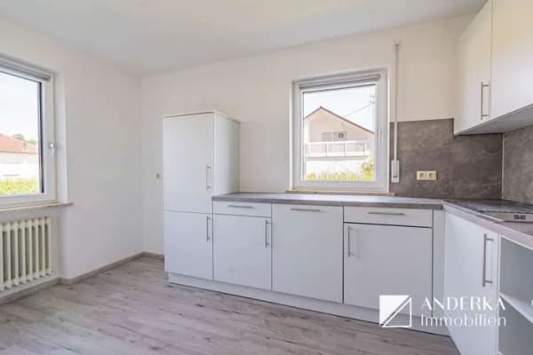 Immobilie in Offingen - Zweifamilienhaus mit Ausbaureserve, großem Grundstück & frischen Modernisierungen - Bild 1