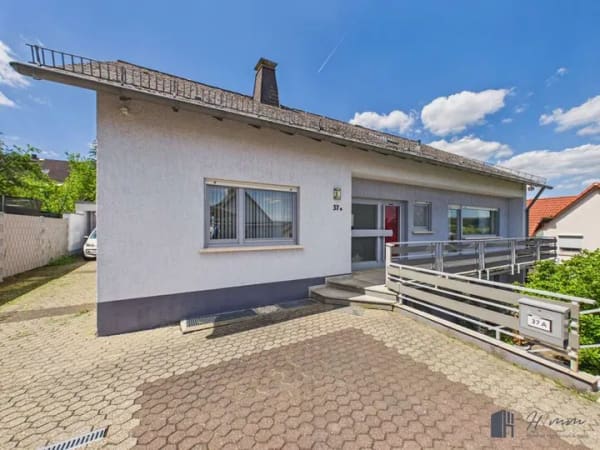 Immobilie in Eitelborn - Zuhause für die ganze Familie: Gepflegtes Einfamilienhaus mit Einliegerwohnung in Eitelborn! - Bild 0