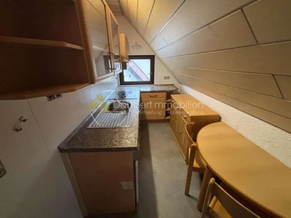Immobilie in Heiningen - Vermietete 2-Zimmer-Dachgeschosswohnung mit großer Garage in Heiningen - Bild 2