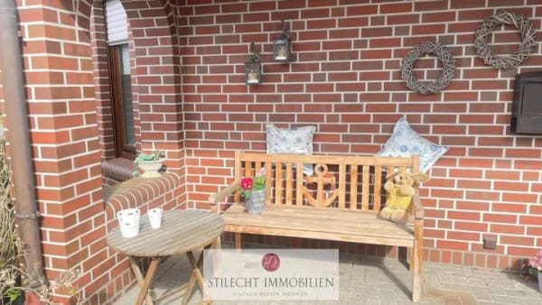Immobilie in Saterland - Schönes Eigenheim mit Wohlfühlfaktor - Kaminofen, neuw. Heizung, EBK & große Garage! - Bild 1