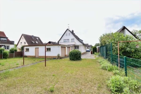 Immobilie in Rüsselsheim am Main - Großes Einfamilienhaus mit großem Grundstück
in der A-Siedlung - Bild 1