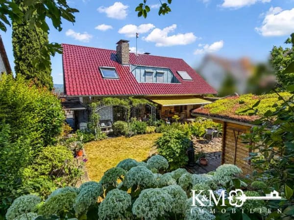 Immobilie in Rhens - Besonderes Einfamilienhaus in Rhens: Traumgarten, Panoramafenster & viel Platz - Bild 0