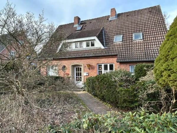 Immobilie in Lensahn - Einfamilienhaus mit Gewerbeeinheit / Praxis / Büro  in Lensahn zu verkaufen. - Bild 0