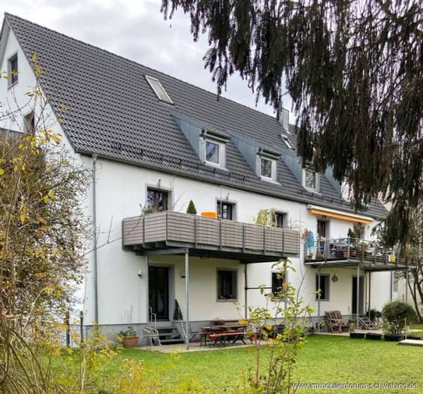 Immobilie in Unterföhring - 3-Zimmer-Wohnung mit Sonnenterrasse, 400 m² Gartenanteil und beheizten Hobby-Raum in Unterföhring! - Bild 0