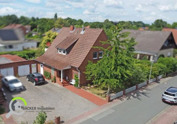 Immobilie in Lemförde - Wohnen mit Herz und Möglichkeiten: Haus mit Einliegerwohnung und Gartenoase - Bild 0