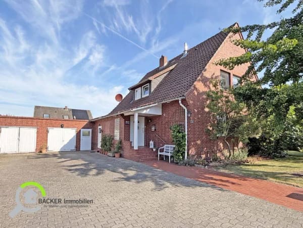 Immobilie in Lemförde - Wohnen mit Herz und Möglichkeiten: Haus mit Einliegerwohnung und Gartenoase - Bild 1