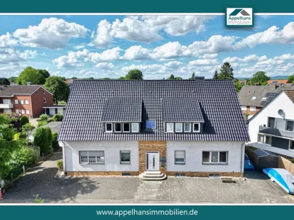 Immobilie in Versmold - Mehrfamilienhaus mit vier vermieteten Wohneinheiten – Ihr neues Anlageobjekt - Bild 0