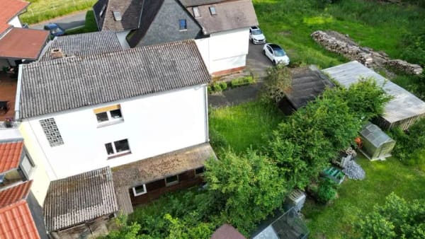Immobilie in Ebsdorfergrund - Idyllisches Wohnen am Naturschutzgebiet: Einfamilienhaus mit Potenzial in Frauenberg - Bild 1