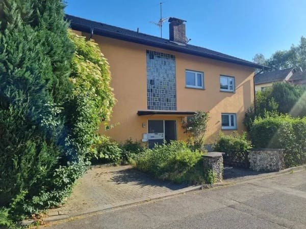 Immobilie in Schliengen - Mehrfamilienhaus mit 3 Wohnungen und großem Garten in Schliengen - Bild 1