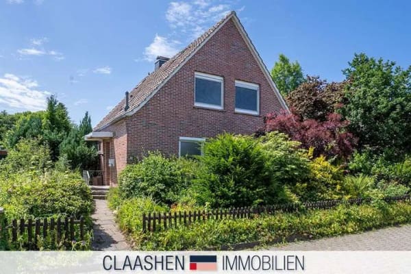 Immobilie in Lütetsburg - Einfamilienhaus mit Baugrundstück - Bild 0