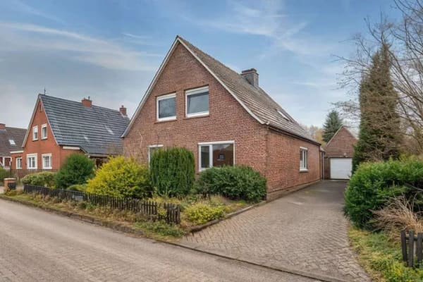 Immobilie in Lütetsburg - Einfamilienhaus mit Baugrundstück - Bild 1