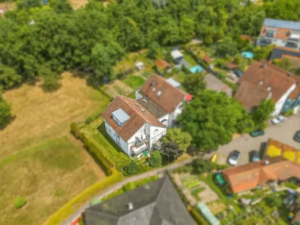 Immobilie in Weissach im Tal - Renovierungsbedürftige 1-Zimmer-Wohnung mit Terrasse und Garage! - Bild 1