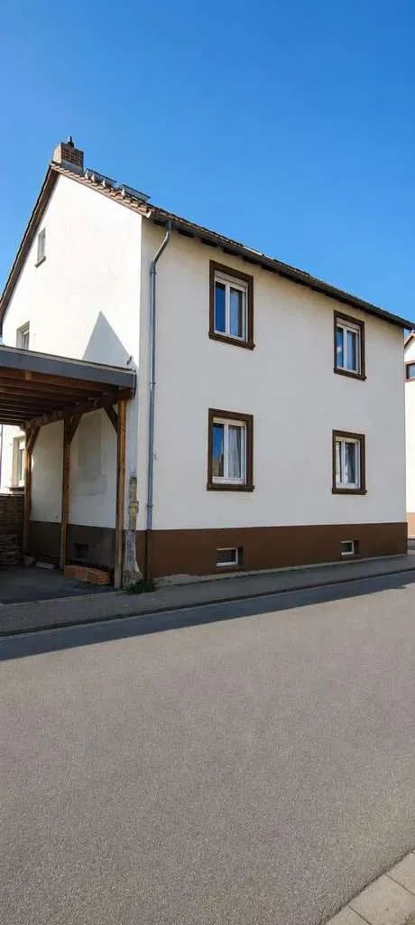 Immobilie in Stockstadt - Einfamilienhaus mit 2 Wohneinheiten auf einem (WEG) geteilten Grundstück mit Sondernutzungsrechten  - Bild 1