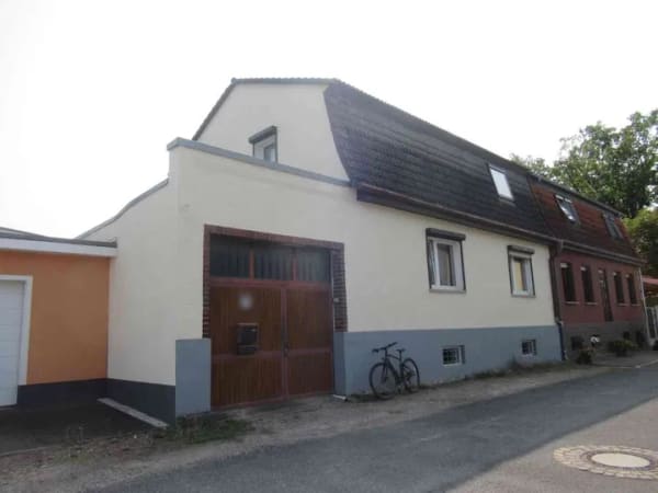 Immobilie in Dessau-Roßlau - DHH mit viel Wohnfläche und großer Werkstatt in Dessau-Roßlau zu verkaufen - Bild 0