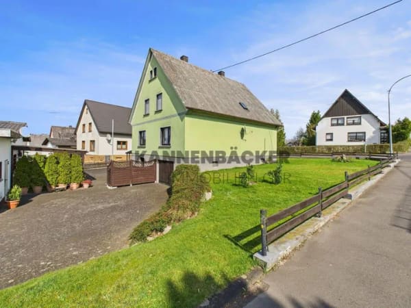 Immobilie in Herschbach - Charmantes Einfamilienhaus mit Keller, Garten und Loggia - Bild 0
