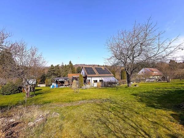 Immobilie in Wüstenrot - Großzügiges Einfamilienhaus mit modernisierter Heizung auf weitläufigem Grundstück - Bild 2