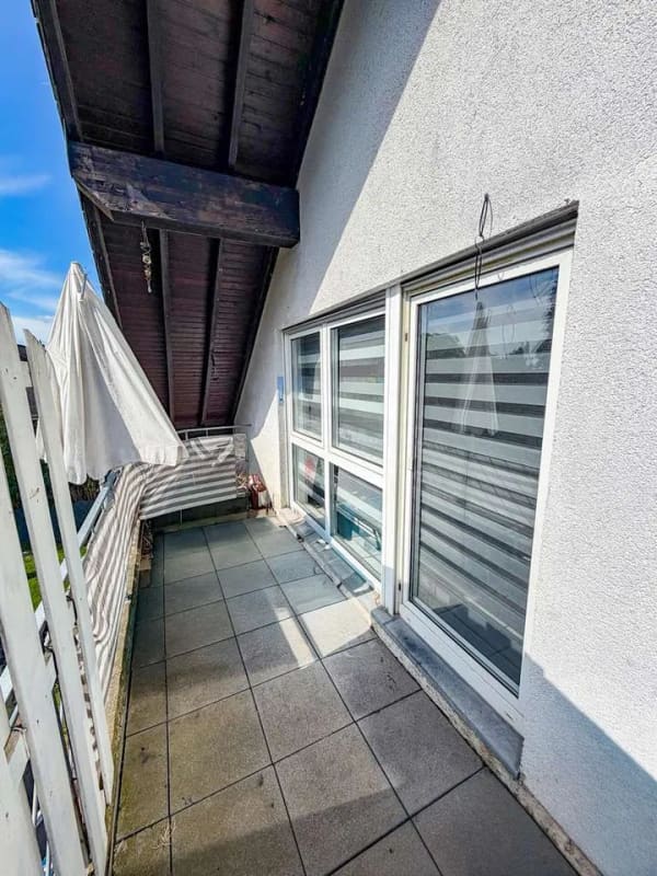 Immobilie in Übach-Palenberg - 3-Zimmer-Wohnung im Dachgeschoss mit Balkon, Blick ins Grüne und Außenstellplatz zentral in Boscheln - Bild 3