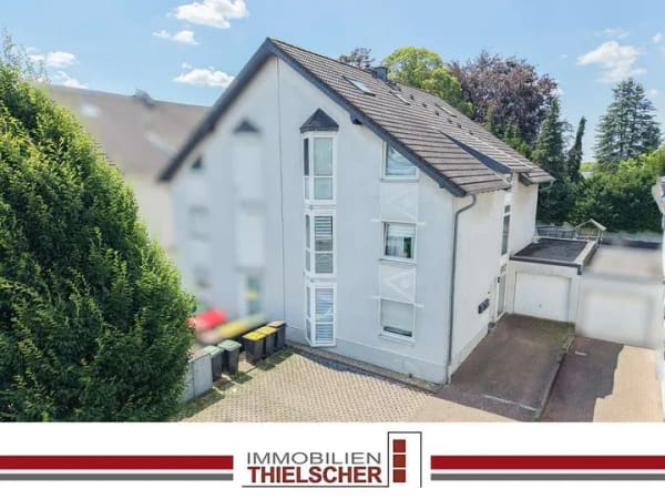 Immobilie in Übach-Palenberg - Kapitalanlage: Drei-Familienhaus in Boscheln mit Garage, Balkonen und Garten - Bild 0
