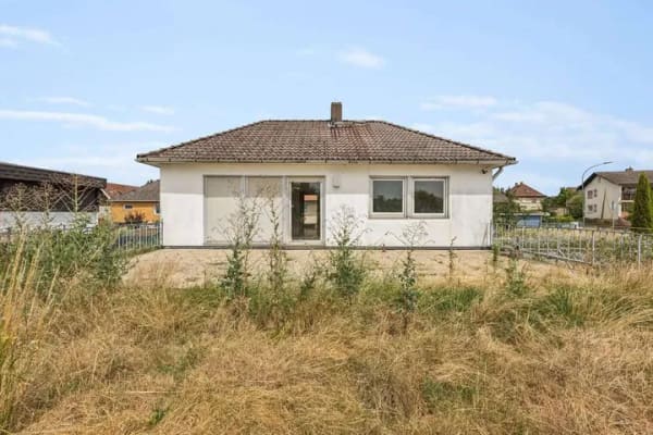 Immobilie in Hungen - Wohnen, wo andere ihre Freizeit verbringen-Einfamilienhaus mit großem Grundstück in Feldrandlage - Bild 1