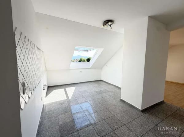 Immobilie in Kolbermoor - Wohnen im historischen Tonwerk - großzügige 4 Zimmer-Dachgeschoss-Wohnung mit Bergblick - Bild 2