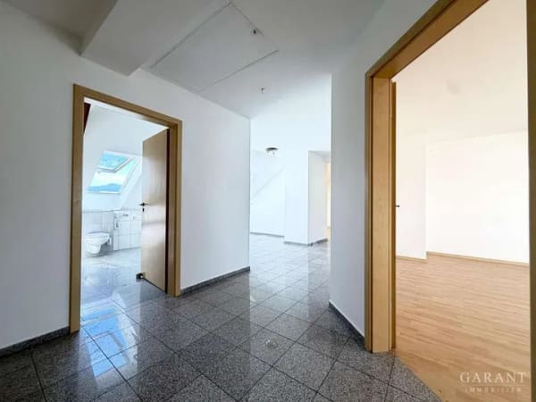 Immobilie in Kolbermoor - Wohnen im historischen Tonwerk - großzügige 4 Zimmer-Dachgeschoss-Wohnung mit Bergblick - Bild 3