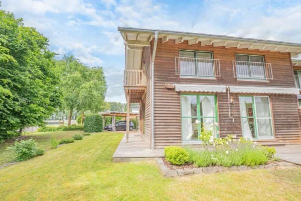Immobilie in Neuenkirchen-Vörden - Holzhaus-Charme trifft Wohnkomfort in toller Lage - Bild 1
