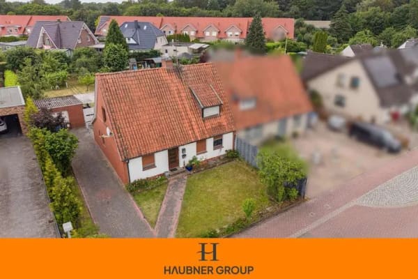 Immobilie in Cloppenburg - Doppelhaushälfte mit großem Grundstück und Wintergarten zentral in Cloppenburg! - Bild 0