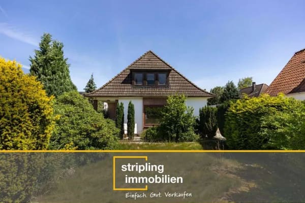Immobilie in Ganderkesee - Ganderkesee – Schönemoor | Freistehendes Zweifamilienhaus mit 976 m² großem Südgarten - Bild 0