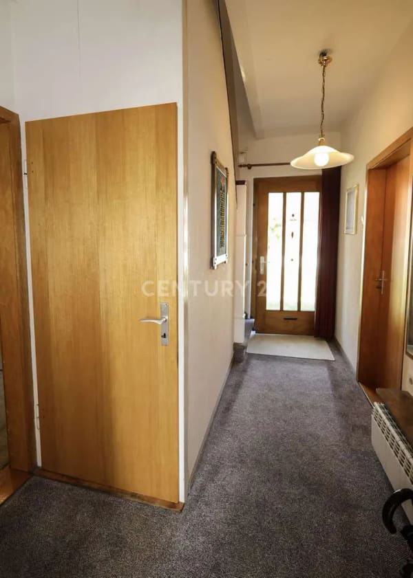 Immobilie in Schüttorf - Einfamilienhaus mit zwei Grundstücksanteilen - Bild 1