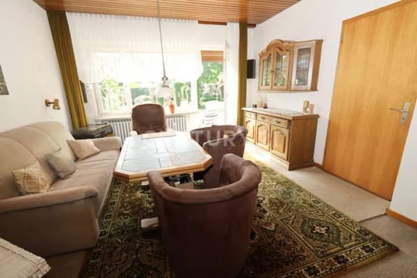 Immobilie in Schüttorf - Einfamilienhaus mit zwei Grundstücksanteilen - Bild 2