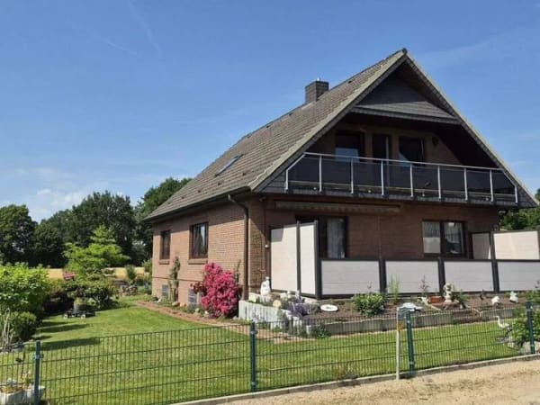 Immobilie in Börgerende-Rethwisch - Wohnen am Feldrand ! Gepflegtes Einfamilienhaus mit Einliegerwohnung, Vollkeller und traumhaftem Garten - Bild 0