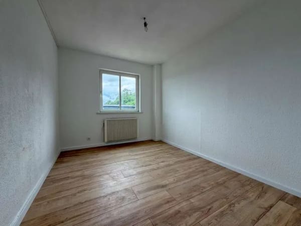 Immobilie in Efringen-Kirchen - Kaufen statt mieten, renovierte 3-Zi.-Wohnung mit Kaminofen, neuem Bad und Gartennutzung - Bild 4
