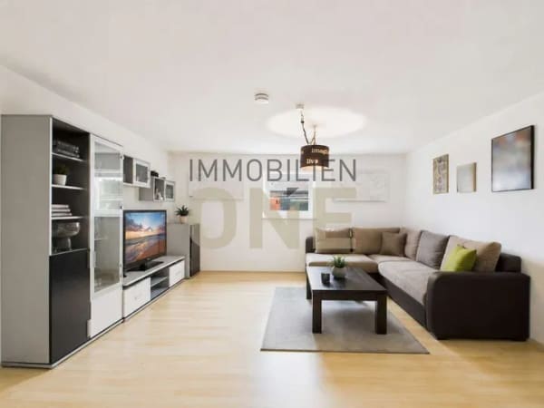 Immobilie in Kümmersbruck - 2,5 Zimmer-Souterrainwohnung mit großer Terrasse und Garage - Bild 0