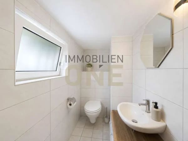 Immobilie in Kümmersbruck - 2,5 Zimmer-Souterrainwohnung mit großer Terrasse und Garage - Bild 3