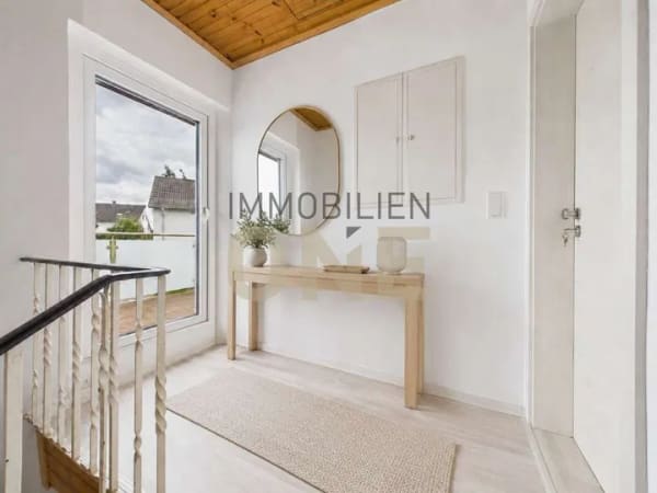 Immobilie in Kümmersbruck - Modernisierte 3,5-Zimmerwohnung mit Südbalkon und großer Werkstatt - Bild 2